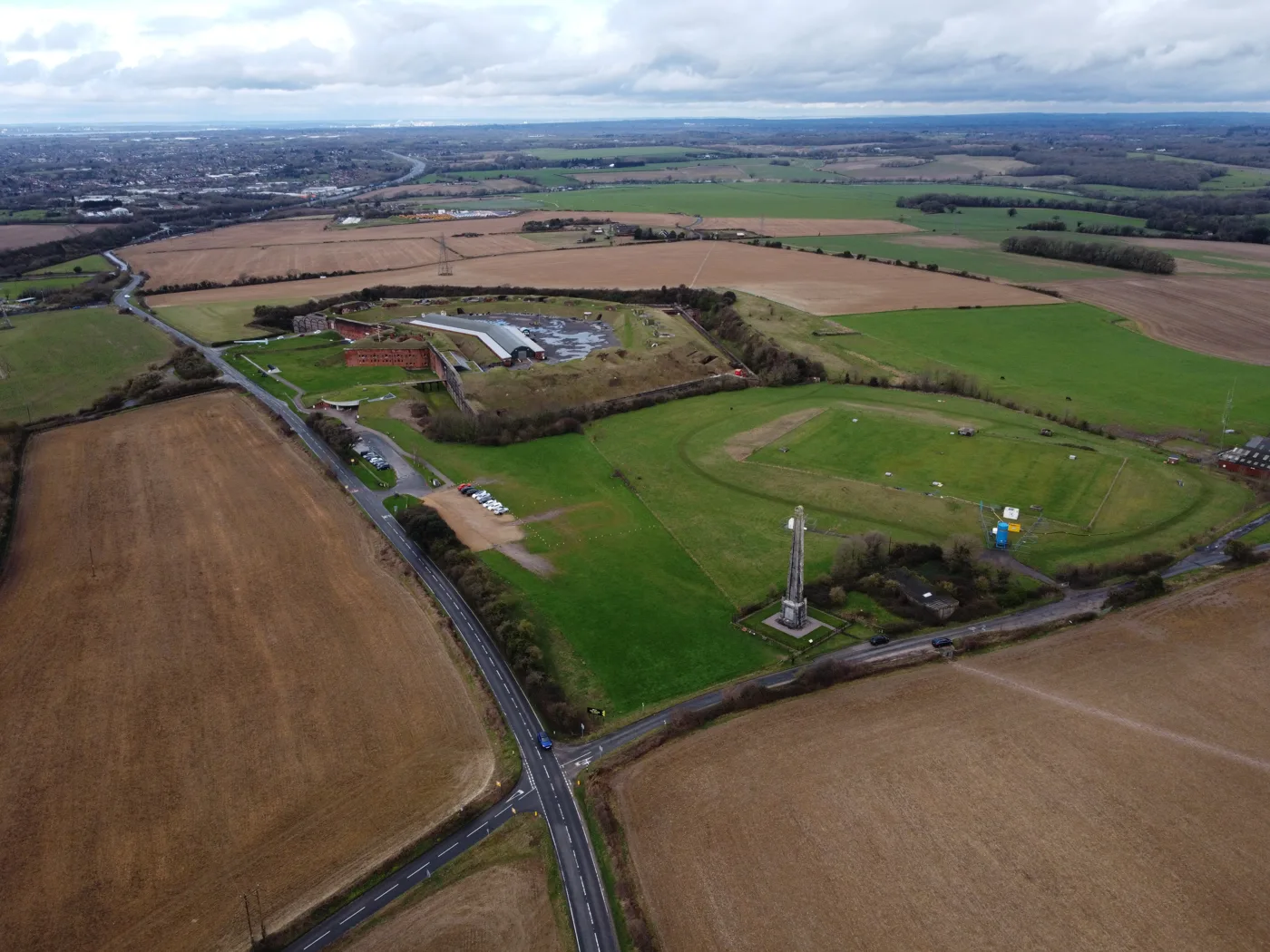 Fort Nelson from the air, on Portsdown Hill, with the Nelson Monument in the foreground. The Royal Armouries fort is free to enter and runs free Halloween activities every day of half term